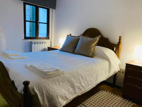 Ein Bett oder Betten in einem Zimmer der Unterkunft Grandma's Carolina Villa