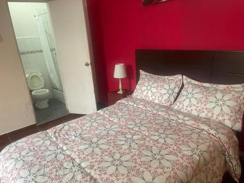 Un pat sau paturi într-o cameră la Great Partners hostel