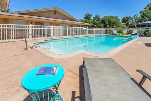 a swimming pool with a blue table in front of a house at Designer Poolside 1Bed1Bth Retreat in La Mesa