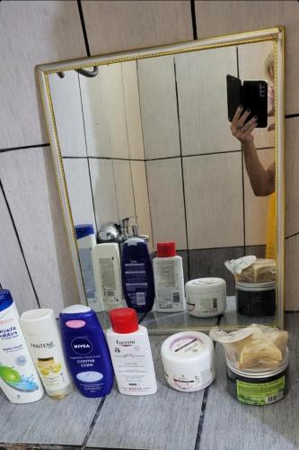 a person taking a picture in front of a mirror at Ana in Paraćin