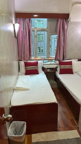 Postel nebo postele na pokoji v ubytování Piaget guest house