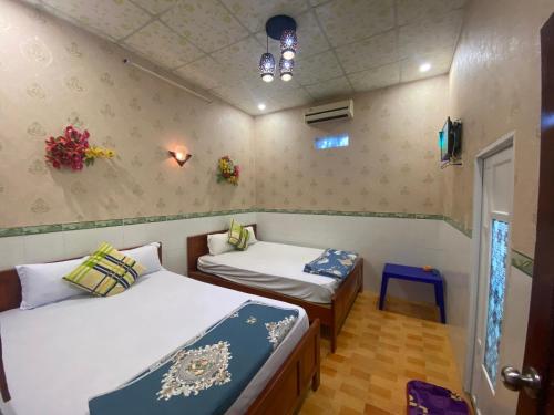 Hotel Việt Sangにあるベッド