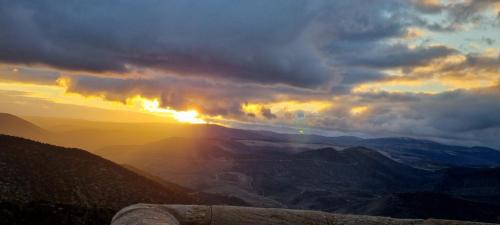 a view of the sunset from the top of a mountain at Las Abadías in San Felices