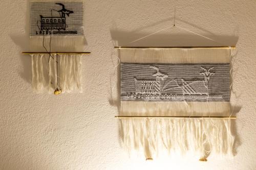 a wall with a curtain with a picture of animals at Patio Relax - 200m from beach - Villasimius in Notteri