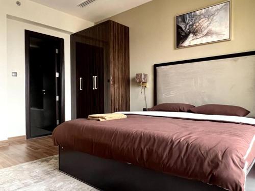 Postel nebo postele na pokoji v ubytování Burj Khalifa View Downtown, Elite 1 Downtown Residence