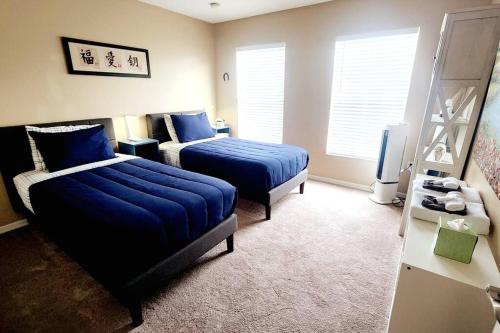 Ένα ή περισσότερα κρεβάτια σε δωμάτιο στο Spacious 6BR Pool Home in Ocala