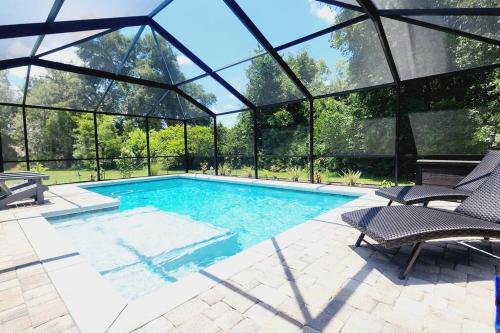 Πισίνα στο ή κοντά στο Spacious 6BR Pool Home in Ocala
