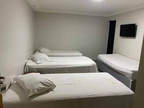 Posteľ alebo postele v izbe v ubytovaní Nasser Hotel Aeroporto