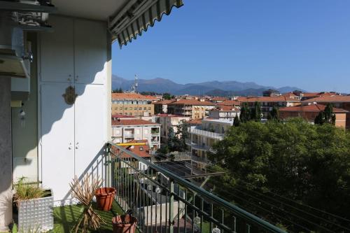 a balcony with a view of a city at In Famiglia in Biella