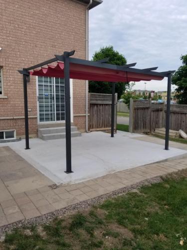 a shelter in front of a brick building at Luxury Home in Mississauga in Mississauga