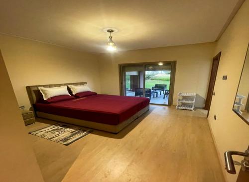 Ένα ή περισσότερα κρεβάτια σε δωμάτιο στο Appartement Prestigia Golf City Marrakech - Porte Agate - Gated community Rez-de-Jardin