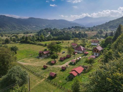 an aerial view of a village in the mountains at Camp &Apartmens Scepanovic in Mojkovac