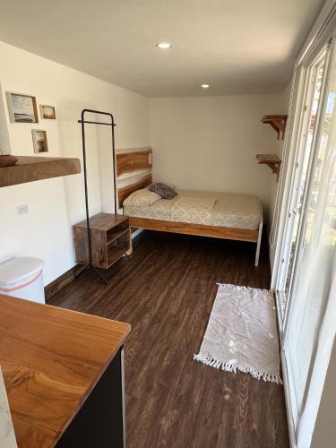 a room with two beds in a room at Panama Kite Center in Punta Chame