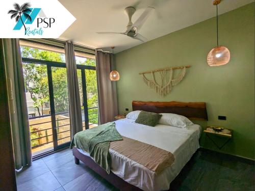 Ένα ή περισσότερα κρεβάτια σε δωμάτιο στο Villa Vicenta II