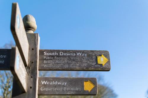 a sign for the south downs way and walkway concourses at Sleep Hotel in Worthing