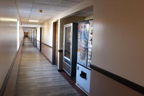 a hallway of an office building with a video game at Bellevue Hotel and Suites in Bellevue