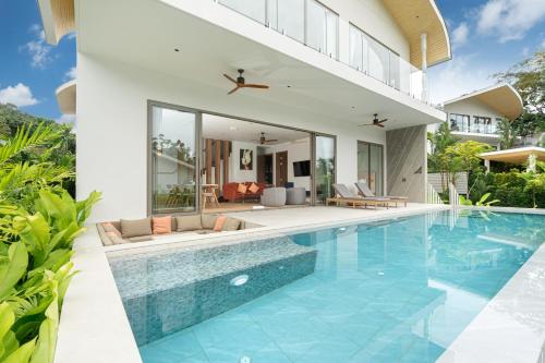 an image of a swimming pool in a villa at Himmapana Villas - Hills in Kamala Beach