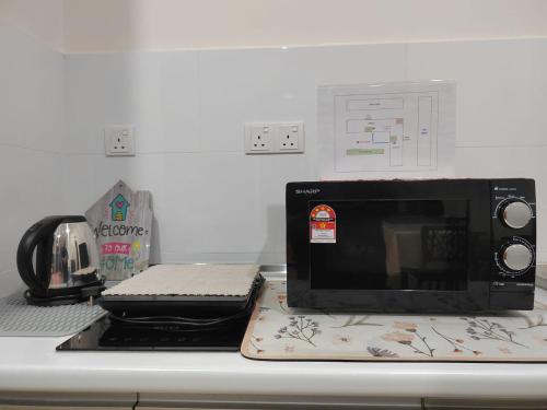 Η κουζίνα ή μικρή κουζίνα στο STUDIO SUITE HOMESTAY KLIA