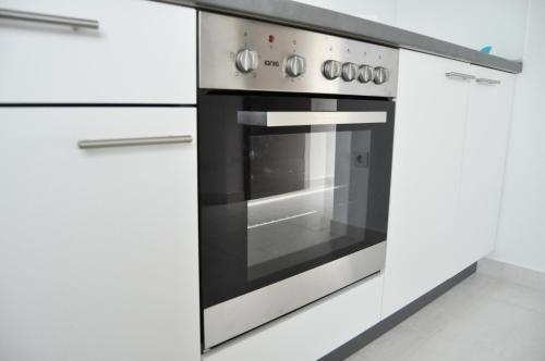 Η κουζίνα ή μικρή κουζίνα στο Apartments Villa Anka