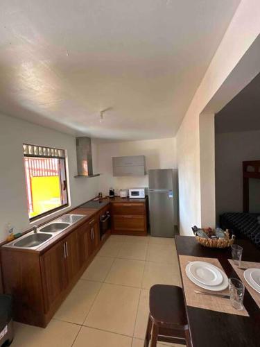 a kitchen with a sink and a counter top at Mana - SRFB 1 in Mana