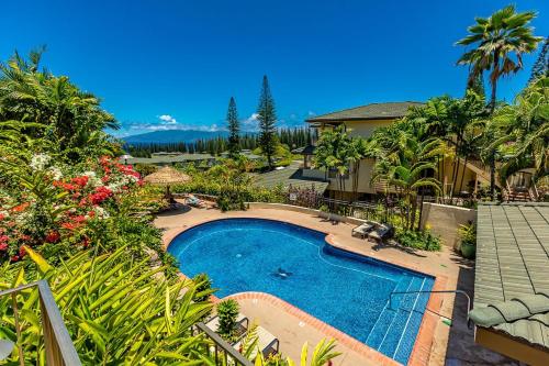 an overhead view of a swimming pool in a garden at Kapalua Golf Villas 15P5-6 condo in Kahana
