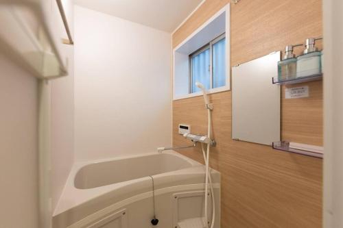駐車場無料！静かな住宅街　５つの寝室でご家族でゆっくりお過ごし頂けます　7台の寝具で最大14名様まで