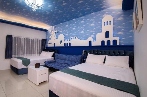 Postel nebo postele na pokoji v ubytování Easy Home Stay