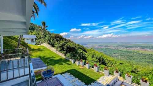 a view from the balcony of a house at Caliraya Heights Resorts and Events Place in Halang