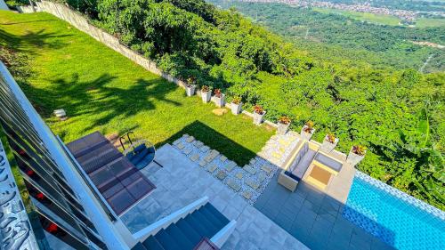 an overhead view of a swimming pool in a backyard at Caliraya Heights Resorts and Events Place in Halang
