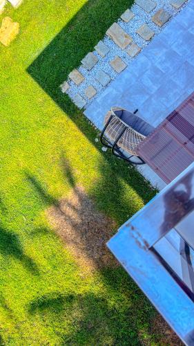 an overhead view of a table and chair next to a pool at Caliraya Heights Resorts and Events Place in Halang