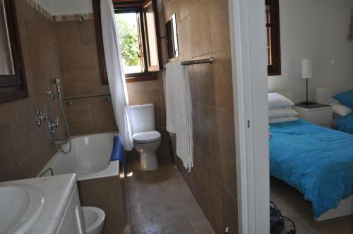 Ванная комната в Poli Home