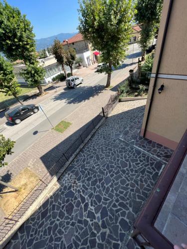 a view from a door of a street with a road at Casa Gabriel in Anghiari