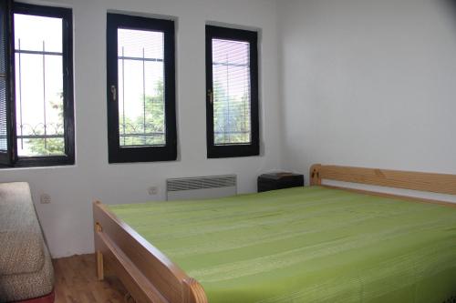 A bed or beds in a room at Villa Panorama Struga, Elen Kamen