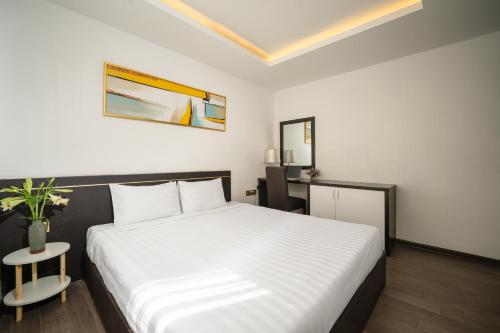 Ένα ή περισσότερα κρεβάτια σε δωμάτιο στο Hanami Suite and Apartment