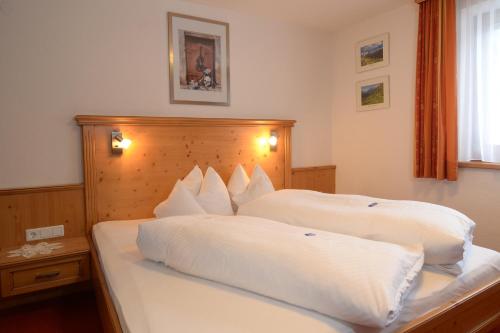 Cama o camas de una habitación en Chalet Paznaun