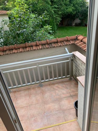 an outside view of a patio with a radiator at Stan na dan Apartman TRG in Derventa