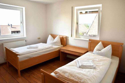 Postel nebo postele na pokoji v ubytování Böbrach Ferienwohnung