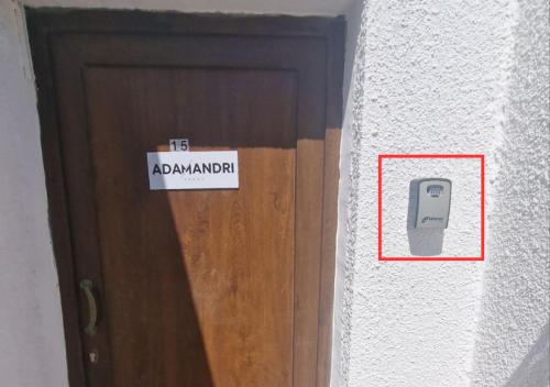 a sign on a door that says it is abnormal at Adamandri Lodge - Prime Location in Ayia Napa