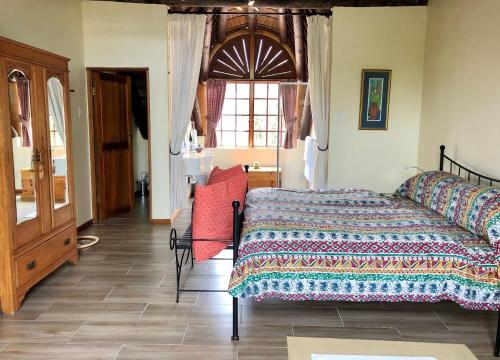 Klein Paradijs Country Retreatにあるベッド