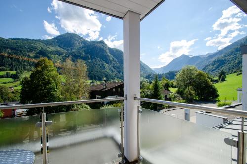 a balcony with a view of mountains at Finest Apartments Glacier View by All in One Apartments in Kaprun