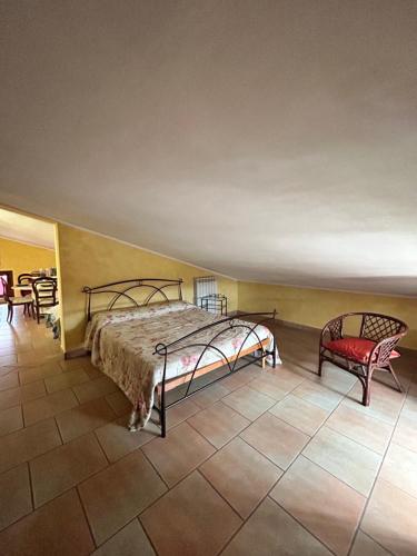 A bed or beds in a room at La Perla di Assisi