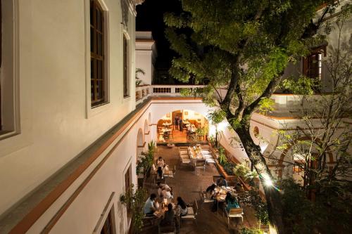 an overhead view of a restaurant at night at Dune de L'orient in Puducherry