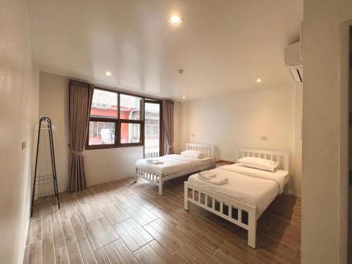 Katil atau katil-katil dalam bilik di Krung Tone Hostel