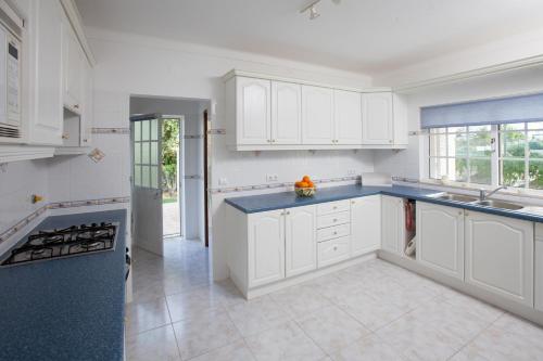 Η κουζίνα ή μικρή κουζίνα στο Quinta do Rosal