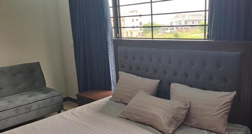 Cama o camas de una habitación en Islamabad 430 B&B Hotel