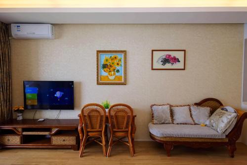 TV a/nebo společenská místnost v ubytování Xiaojing Bay Haige Hotel