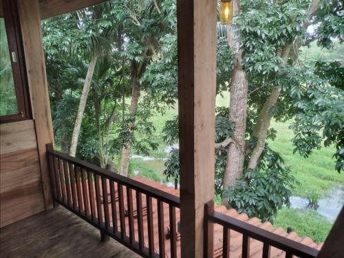 a view from the porch of a cabin at Green Herbal Ayurvedic Eco-Lodge in Galle