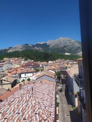 an aerial view of a city with mountains in the background at B&B Sentiero Italia in Latronico