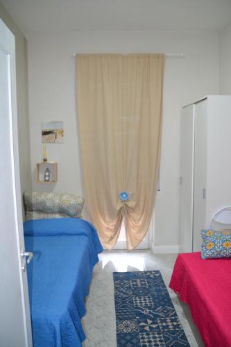 Postel nebo postele na pokoji v ubytování Best Residence Termoli