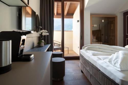 Ansitz Battisti Suitesにあるベッド